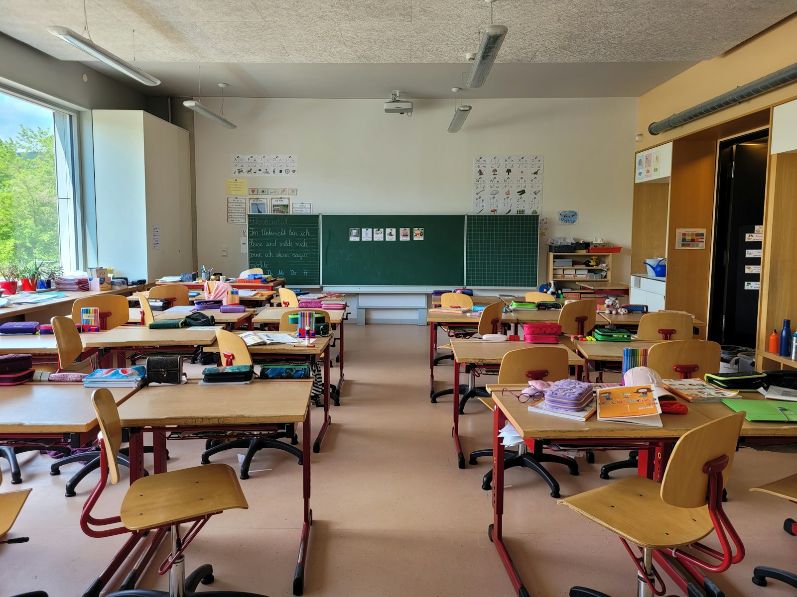An empty classroom of desks and chairs before term starts